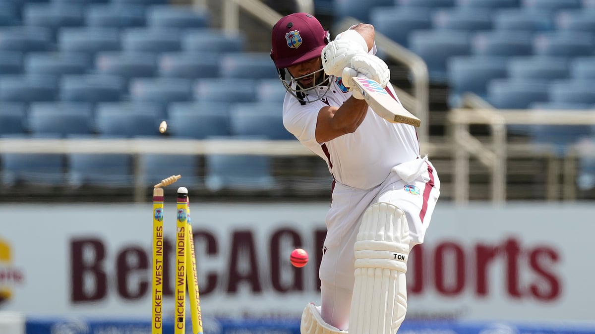AP Photo/Ricardo Mazalan : West Indies' Brandon King is bowled by Australia's Mitchell Starc on day three of the third Test cricket match at Sabina Park in Kingston, Jamaica.
