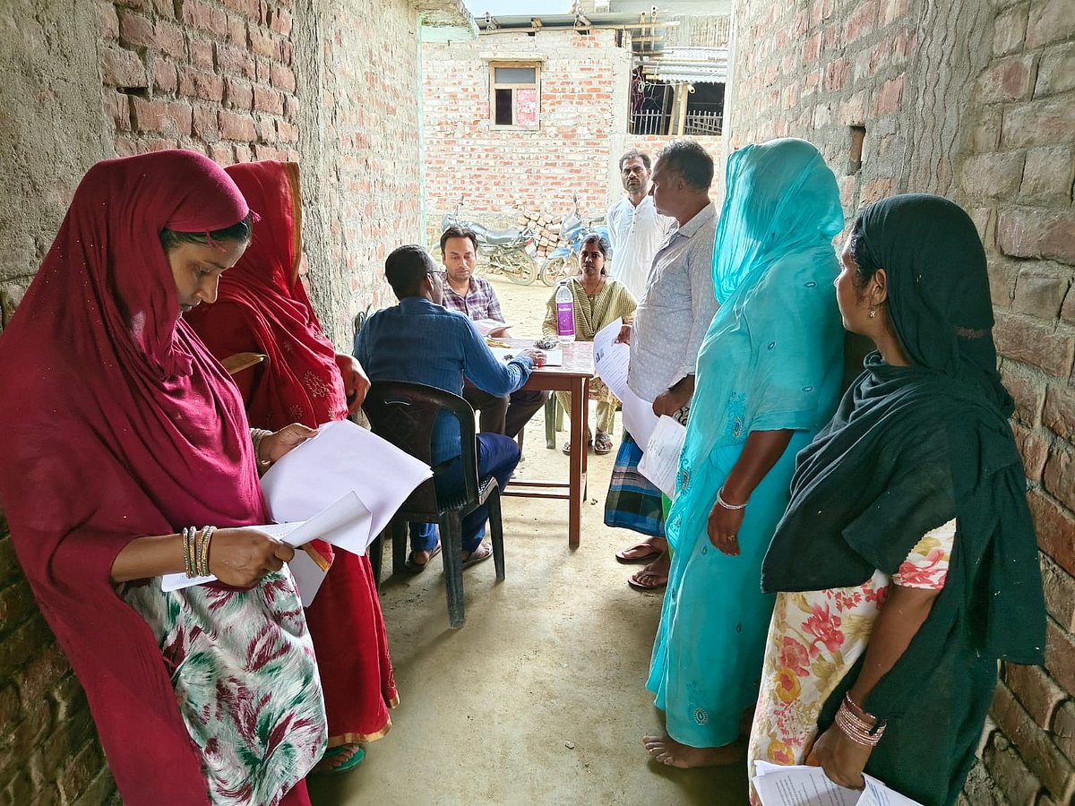 X/@ECISVEEP : Under the Special Intensive Revision (#SIR), #BLOs in Araria are distributing enumeration forms to voters and providing information related to the campaign. | representational image |