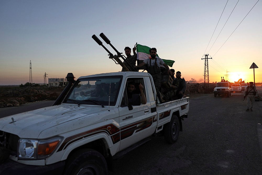 | Photo: AP/Omar Albam : Syria Clashes
