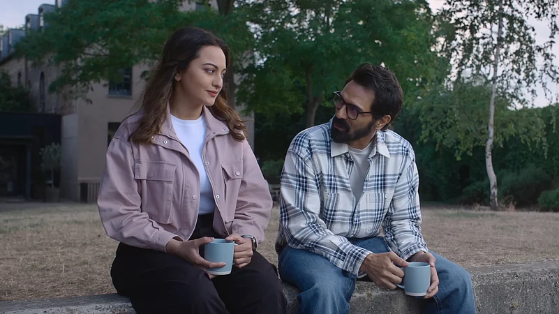 A Still From Nikita Roy (2025) Featuring Sonakshi Sinha & Arjun Rampal