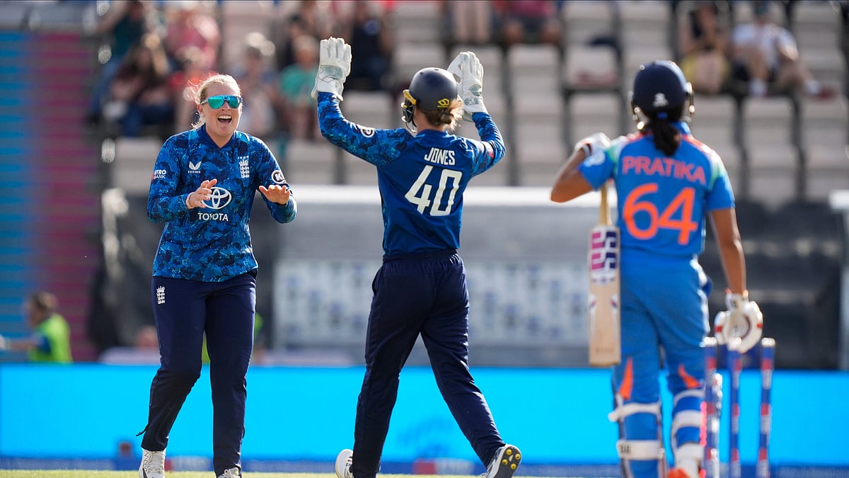 Andrew Matthews/PA via AP : England's Sophie Ecclestone, left, celebrates with Amy Jones after taking the wicket of India's Pratika Rawal (64) during the fifth women's cricket IT20 at the Utilita Bowl, Southampton, England.
