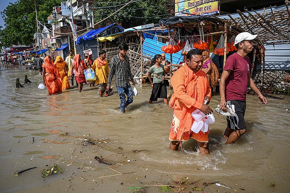 | Photo: PTI : Waterlogging in Prayagraj as Ganga's water level rises