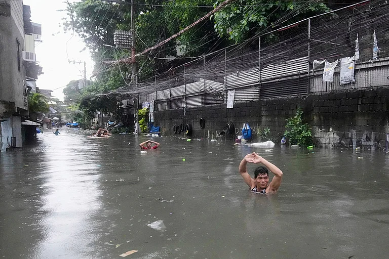 Philippines Typhoon Wipha - | Photo: AP/Aaron Favila