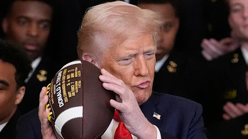 Donald Trump Commander-in-Chief Trophy presentation 2025 White House AP Photo