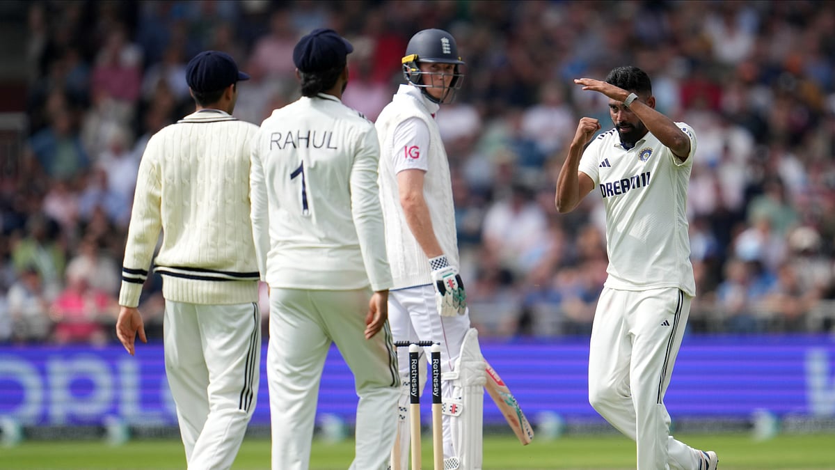 AP Photo/Jon Super : India's Mohammed Siraj, right, call for third umpire's review for the wicket of England's Zak Crawley, center, during the second day of the fourth cricket test match between England and India at Emirates Old Trafford.