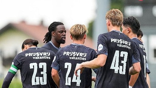 X | Feyenoord : Feyenoord players celebrate a goal against Liefering during a pre-season match.