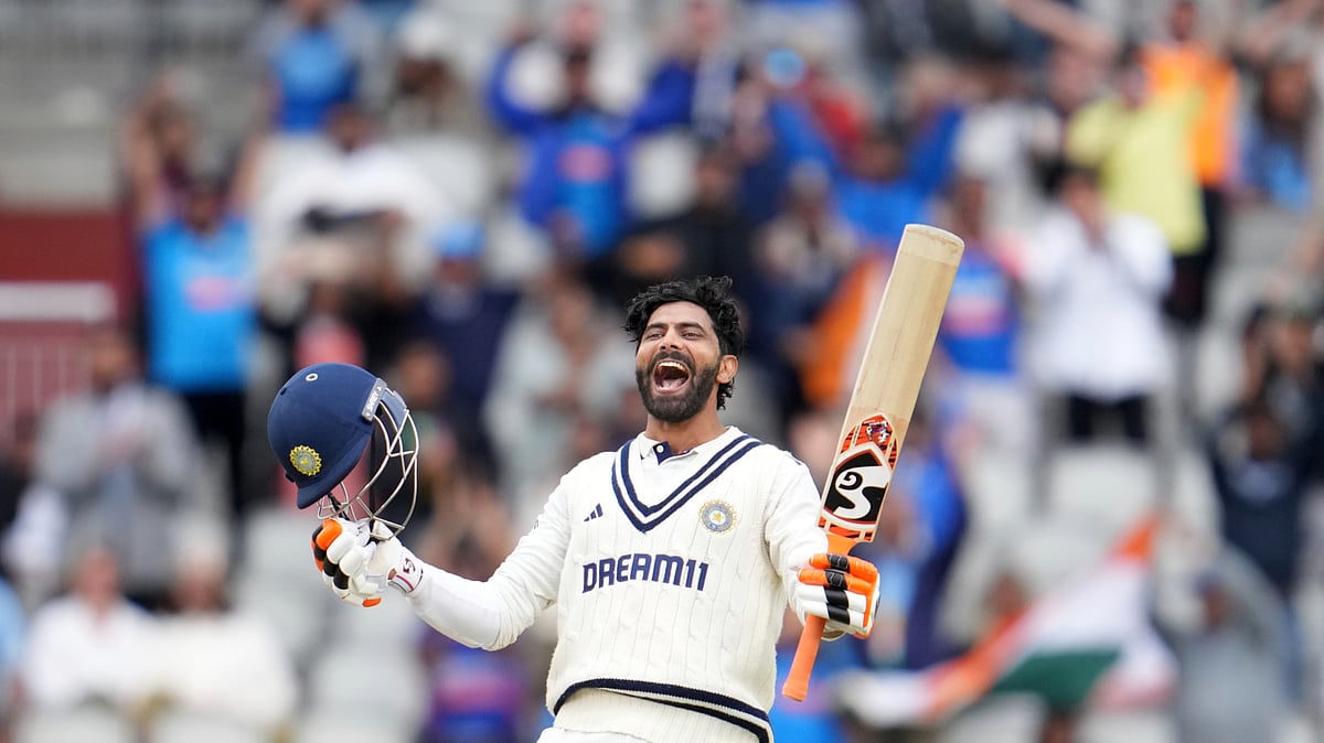 AP Photo/Jon Super : India's Ravindra Jadeja celebrates after scoring a century on the final day of the fourth cricket test match between England and India at Emirates Old Trafford, Manchester.
