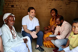 (X/@INCIndia via PTI Photo) : Leader of Opposition in the Lok Sabha, Rahul Gandhi, meets the family members of Dashrath Manjhi — including Anshu Kumari — at Manjhi’s native village, Gehlaur in Gaya, Bihar. Gandhi paid tribute to the 'Mountain Man,' praising his perseverance and courage.