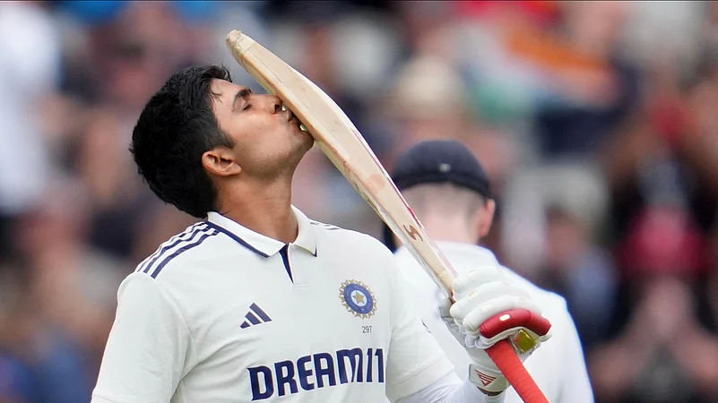 Indias captain Shubman Gill celebrates after scoring a century. AP