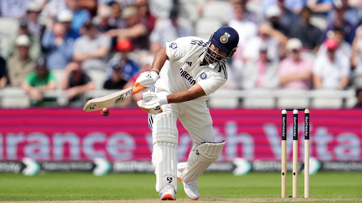 AP Photo/Jon Super : India's Rishabh Pant plays a shot during the second day of the fourth cricket test match between England and India at Emirates Old Trafford, Manchester, England.