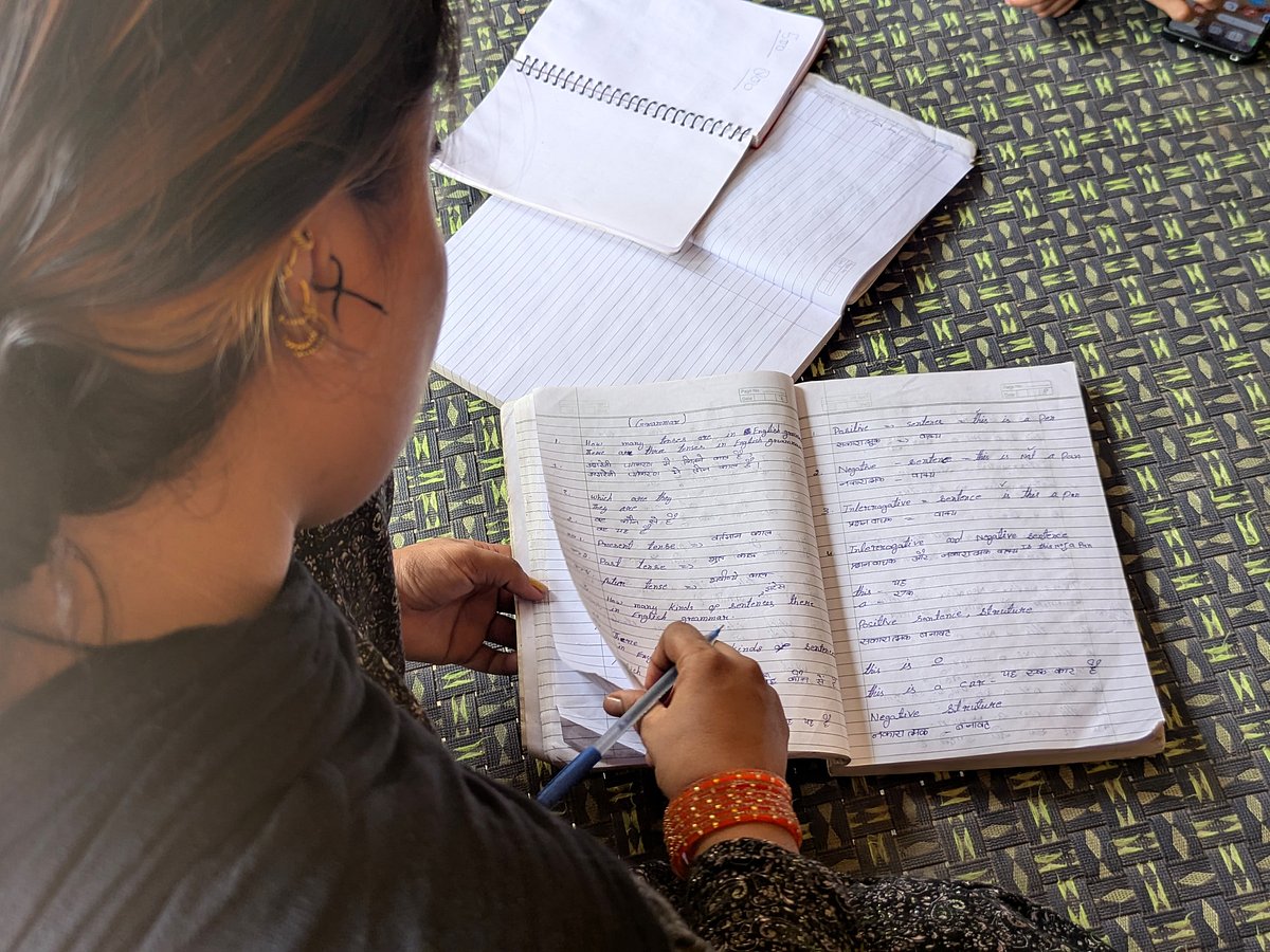 Poonams youngest daughter whos now married, shows her tuition copy. 