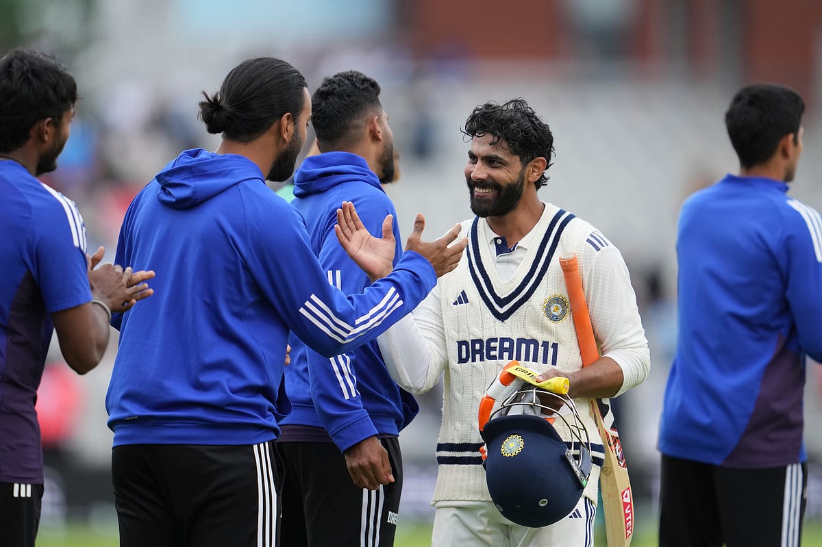 | Photo: AP/Jon Super : India vs England 4th Test: India's Ravindra Jadeja shakes hands with team mates on the day of final day of the fourth cricket test match between England and India at Emirates Old Trafford, Manchester, England, July 27, 2025.