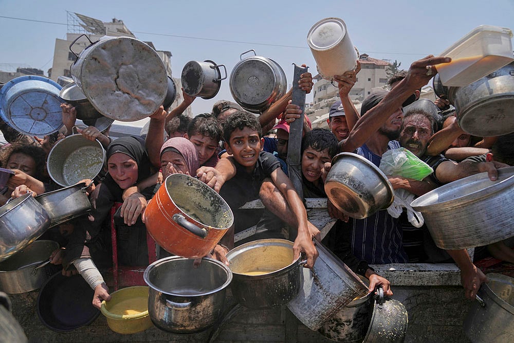 Israel Palestinians: Humanitarian Aid Is Airdropped Into Gaza_7