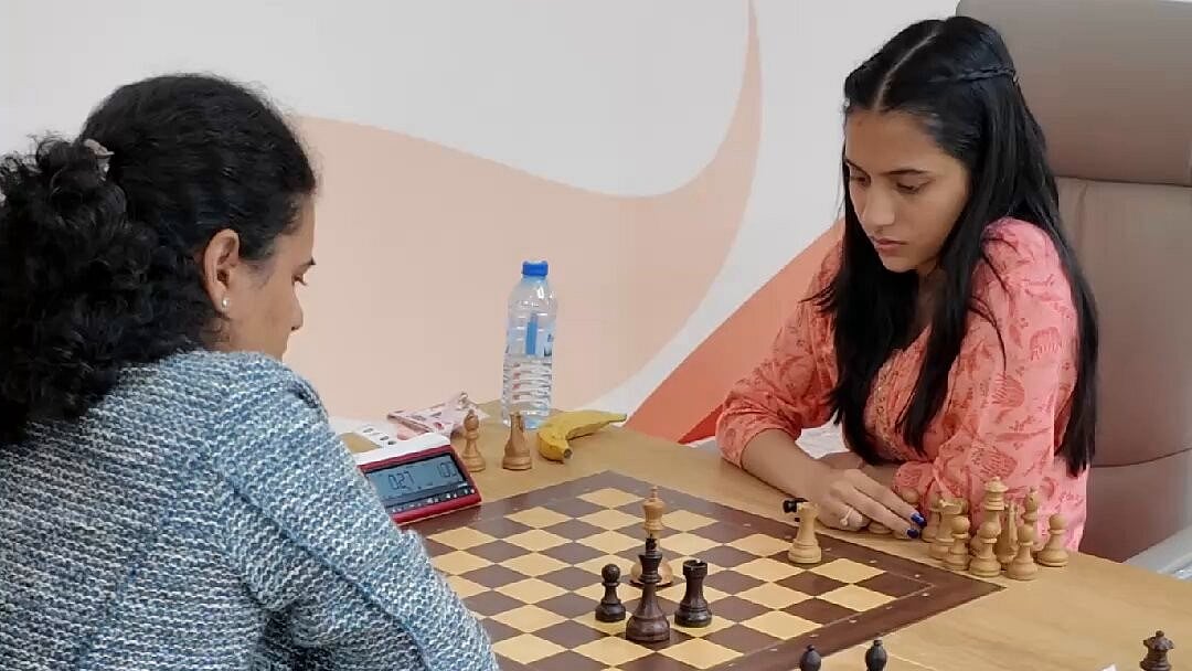 X/International Chess Federation : Divya Deshmukh (right) and Koneru Humpy in action in the FIDE Women's Chess World Cup final.