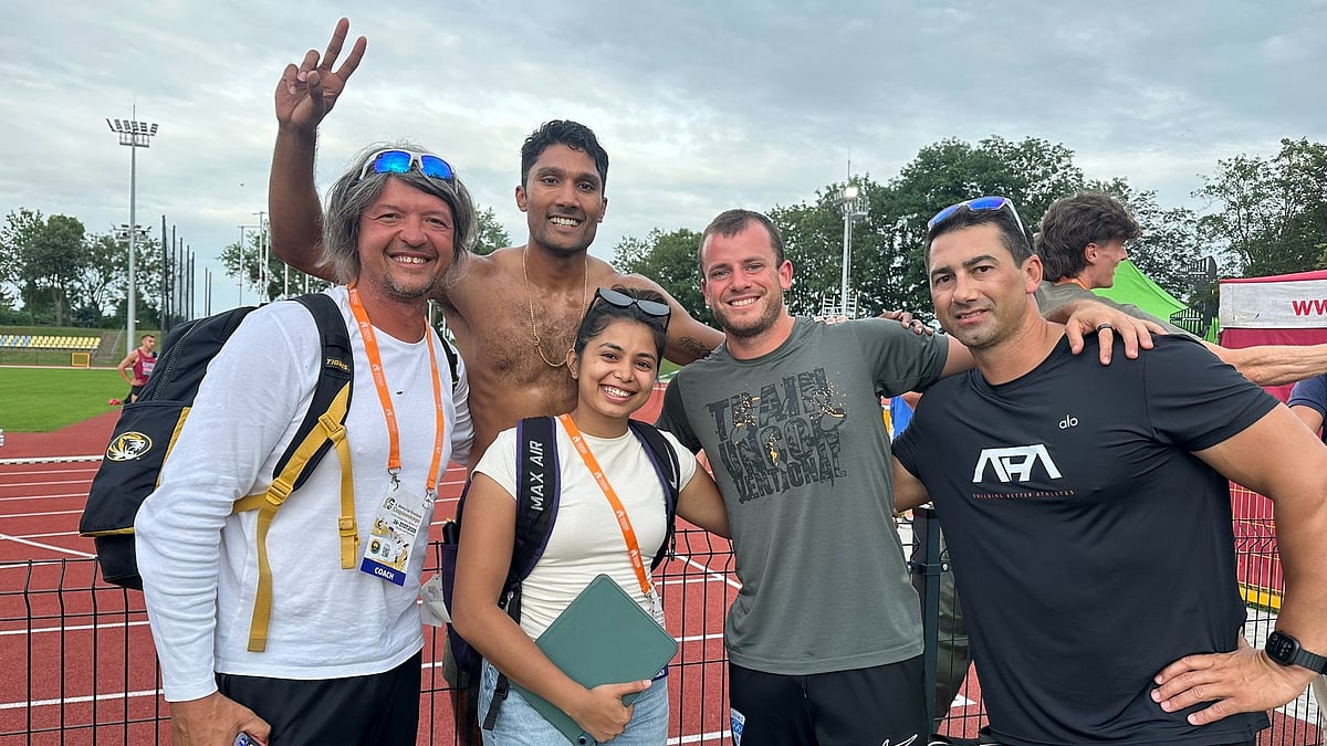 X/Tejaswin Shankar : Tejaswin Shankar (second from left) celebrates after bettering the decathlon national record in Poland.