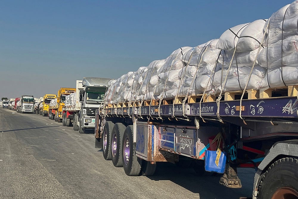 Israel Palestinians: Humanitarian Aid Is Airdropped Into Gaza_9