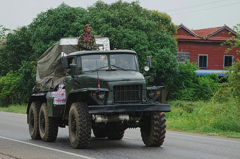 A Cambodian military vehicle carries rocket launcher in Oddar Meanchey province, Cambodia