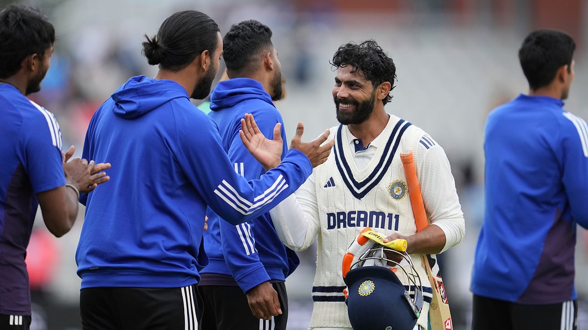 | Photo: AP/Jon Super : India vs England 4th Test: India's Ravindra Jadeja shakes hands with team mates on the day of final day of the fourth cricket test match between England and India at Emirates Old Trafford, Manchester, England, July 27, 2025.