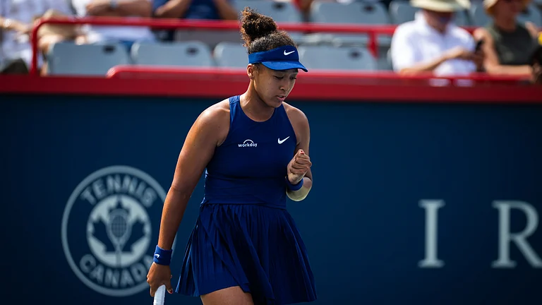 Naomi Osaka celebrates Wednesday's win over Liudmila Samsonova - null