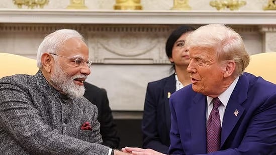 US President Donald Trump (R) with PM Narendra Modi (L) - PTI