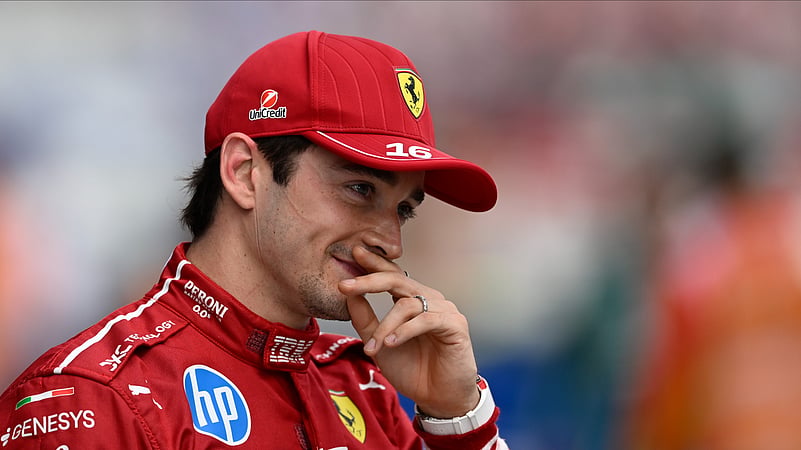 Ferrari driver Charles Leclerc of Monaco celebrates his pole position. AP