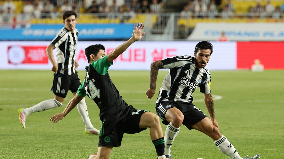 Newcastle Uniteds Sandro Tonali, right, fights for the ball. AP