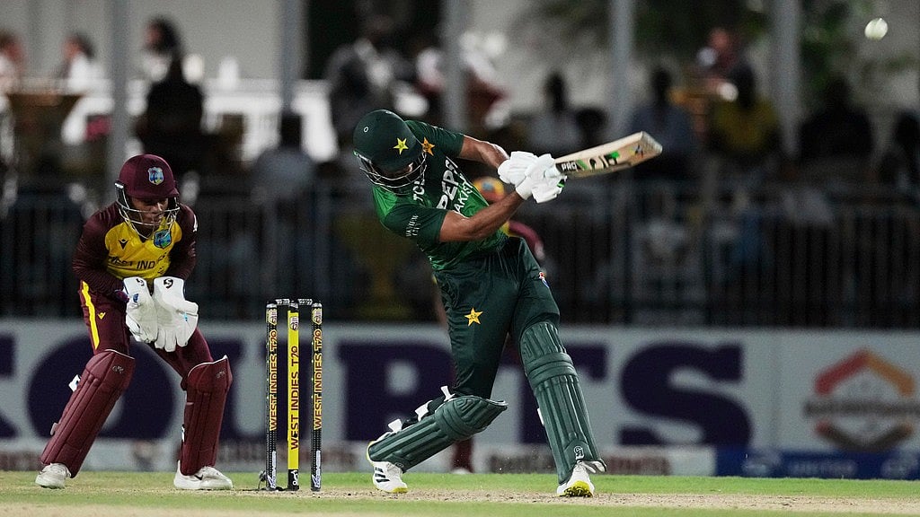 AP : West Indies Vs Pakistan, 1st ODI Highlights: Hasan Nawaz (right) hit an unbeaten 63 off 54 balls in Trinidad.