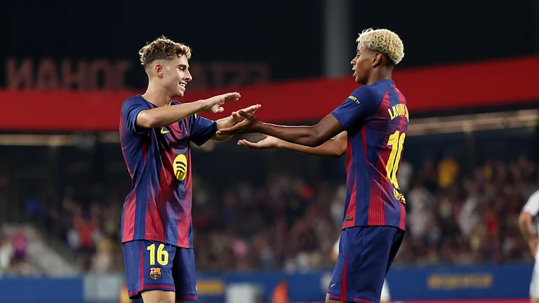 Barcelona's Fermin Lopez and Lamine Yamal - null