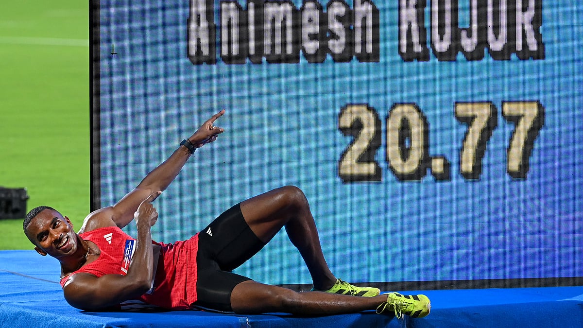 PTI : Odisha sprinter Animesh Kujur poses for photographers after finishing first in the men's 200m final at the World Athletics Continental Tour event in Bhubaneswar.