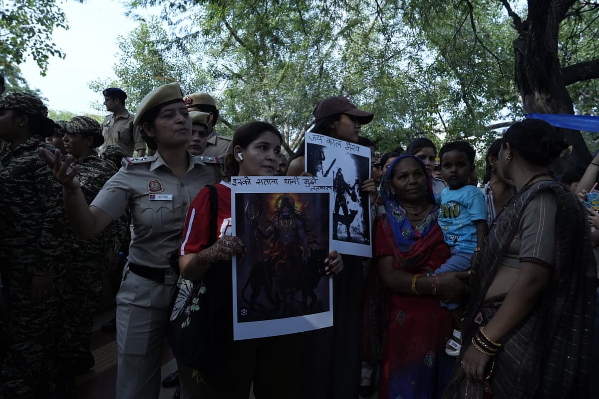 vikram shama | : Demonstrators carrying posters opposing the Supreme Court order |