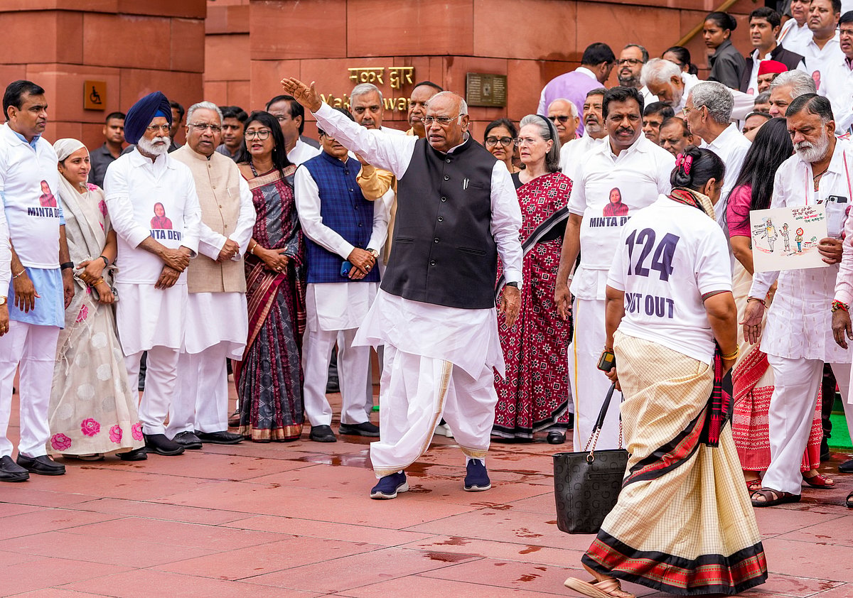 PTI Photo/Ravi Choudhary : New Delhi: Congress President and LoP in the Rajya Sabha Mallikarjun Kharge with party MPs Sonia Gandhi, K Suresh and other INDIA bloc members during a protest over issues of alleged 'poll fraud', Special Intensive Revision of electoral rolls and MSP for onions, at the Monsoon session of Parliament, in New Delhi, Tuesday, Aug. 12, 2025
