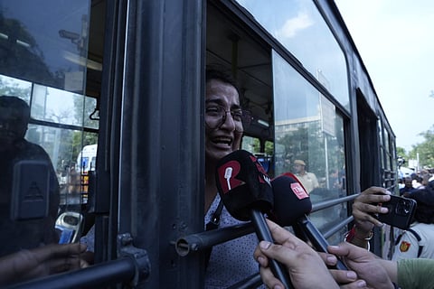 A detained demonstrator