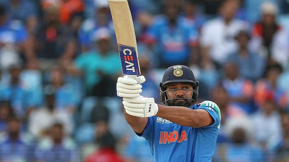 | Photo: AP/Christopher Pike : India's captain Rohit Sharma plays a shot 