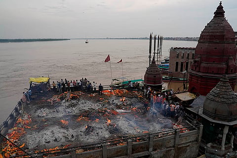 Dom community performing the last rites at Manikarnika Ghat in Varanasi