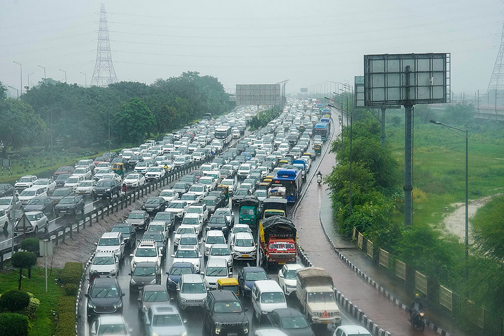 | Photo: PTI/Salman Ali : Weather: Rain in Delhi