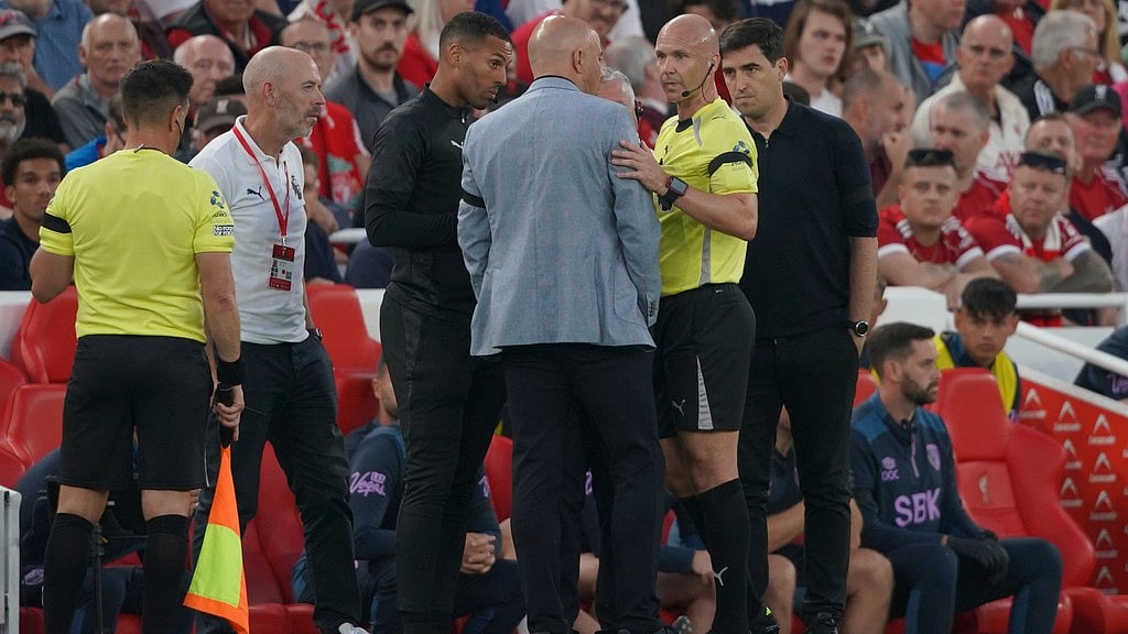 AP/Ian Hodgson : Liverpool's manager Arne Slot, centre, talks to the referee during the English Premier League soccer match between Liverpool and Bournemouth at Anfield stadium in Liverpool, England, Friday, Aug. 15, 2025.