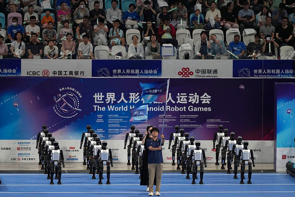 | Photo: AP/Ng Han Guan : World Humanoid Robot Games 2025 Day 1