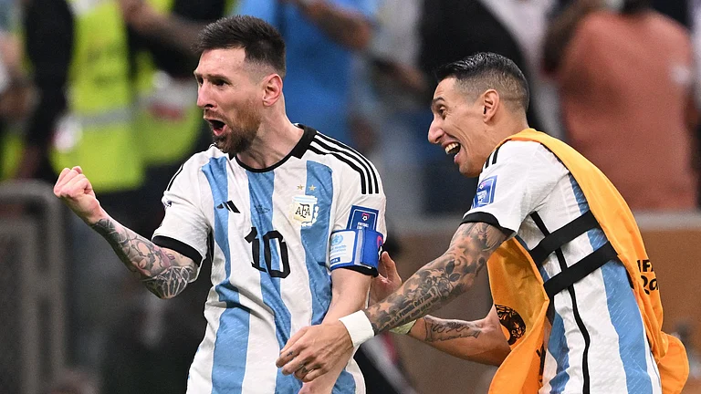 Argentina's Lionel Messi and Angel Di Maria - null