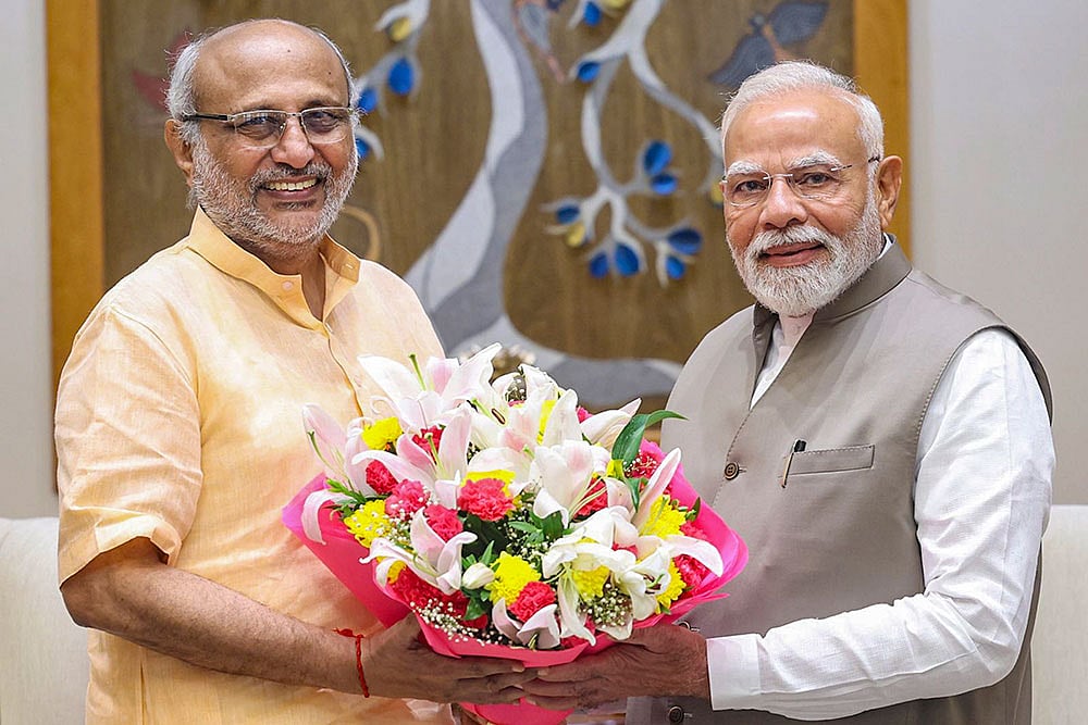 Photo: @narendramodi on X via PTI  : PM Modi with  CP Radhakrishnan