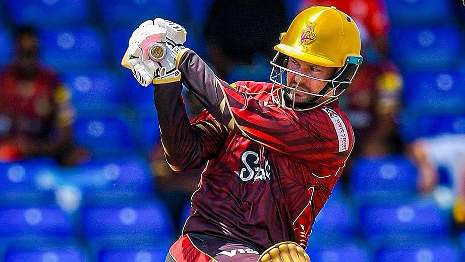 | Photo: X/TKRiders : St Kitts & Nevis Patriots vs Trinbago Knight Riders, CPL 2025: Colin Munro in action for TKR in Match 4.