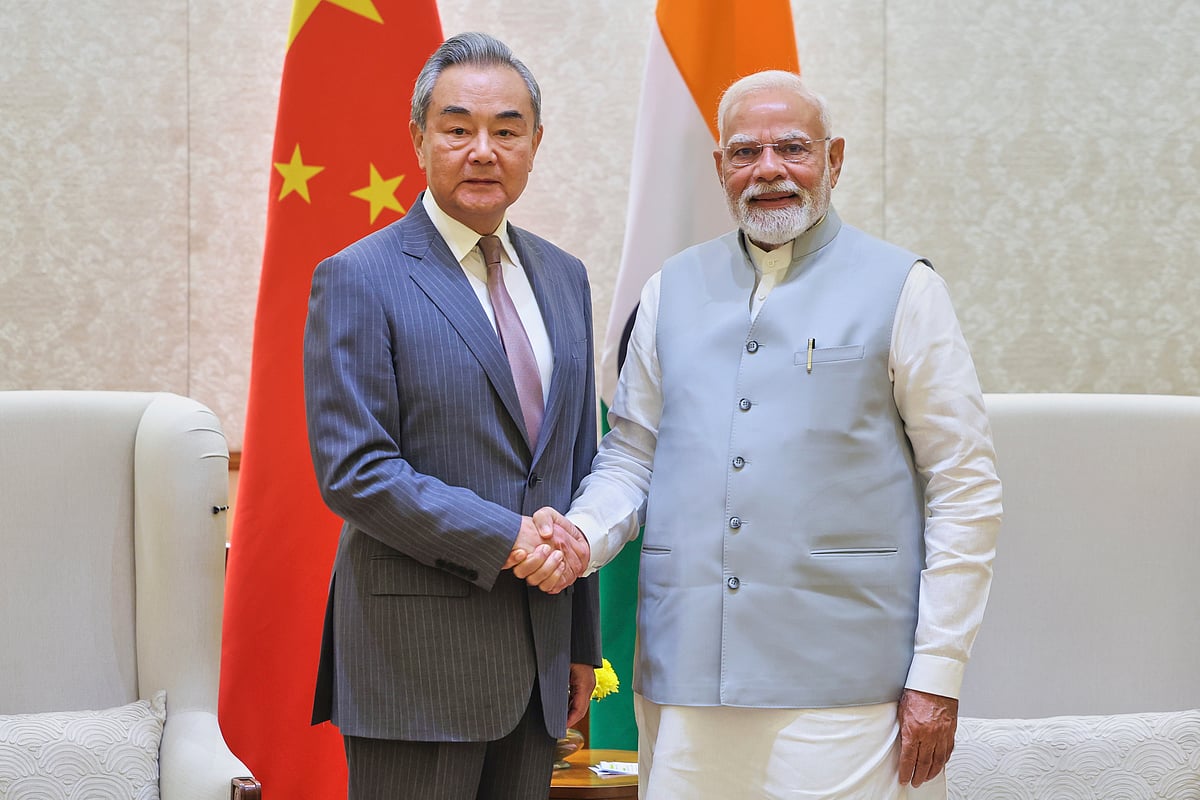Indian Prime Minister's Office via AP : Indian Prime Minister Narendra Modi, right, shakes hand with Chinese Foreign Minister Wang Yi, left, in New Delhi, India, Tuesday, Aug.19, 2025.