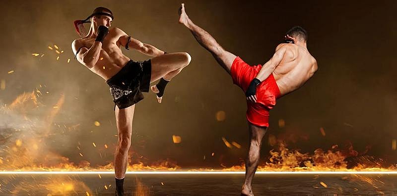 two men are showing their fighting skills