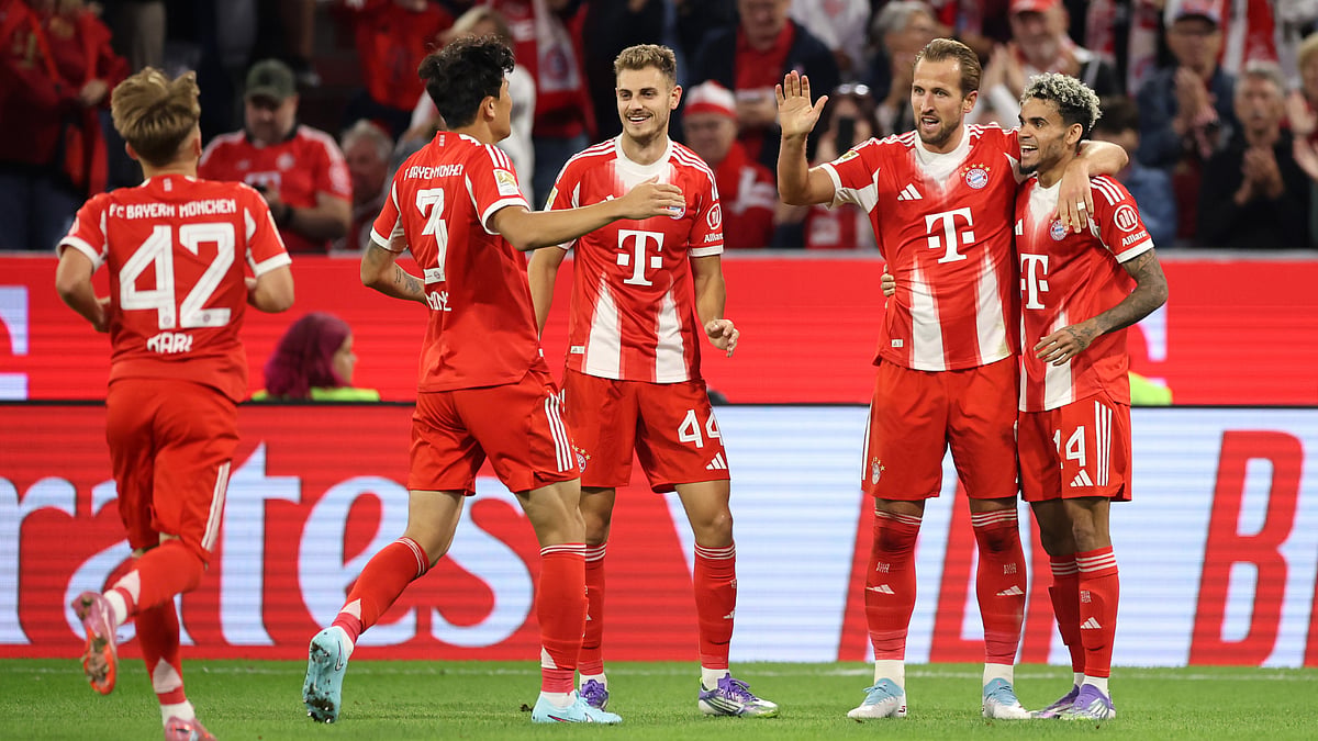 Harry Kane celebrates his hat-trick against RB Leipzig