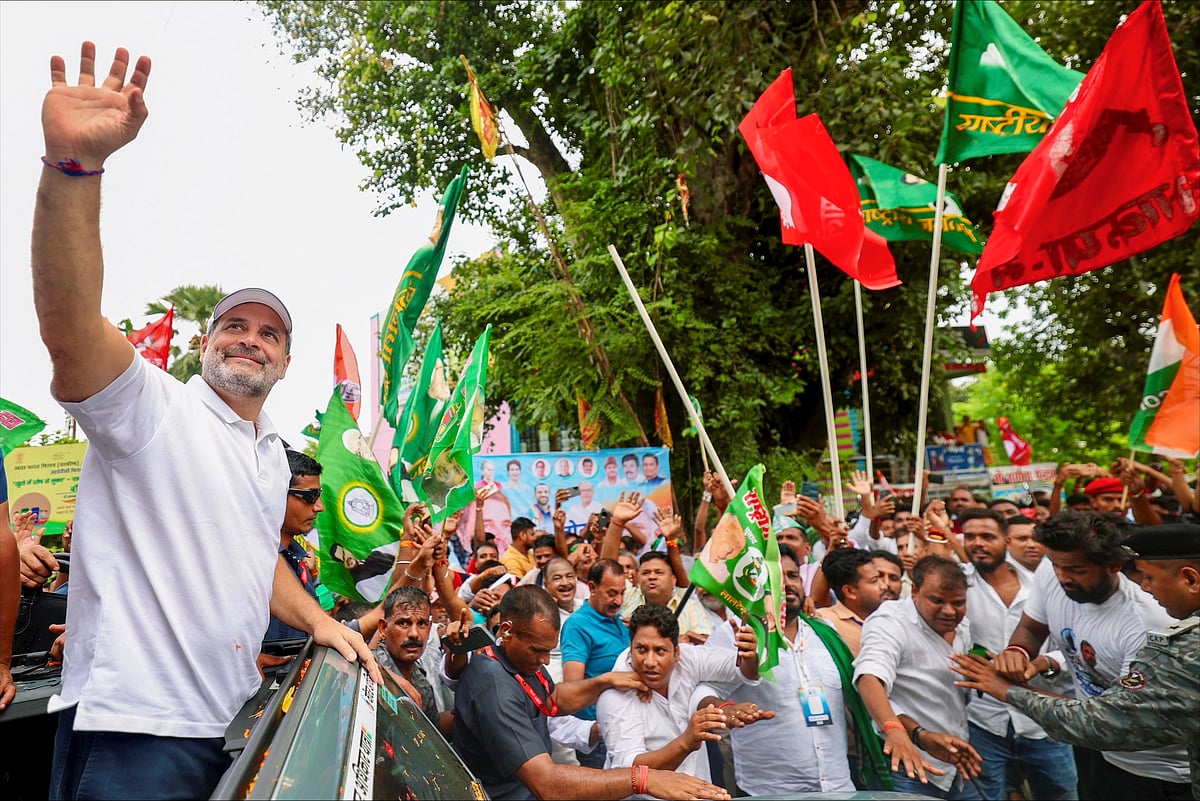 PTI : Aug. 22, 2025, Leader of Opposition in the Lok Sabha Rahul Gandhi greets people during 'Voter Adhikar Yatra', in Bihar. 