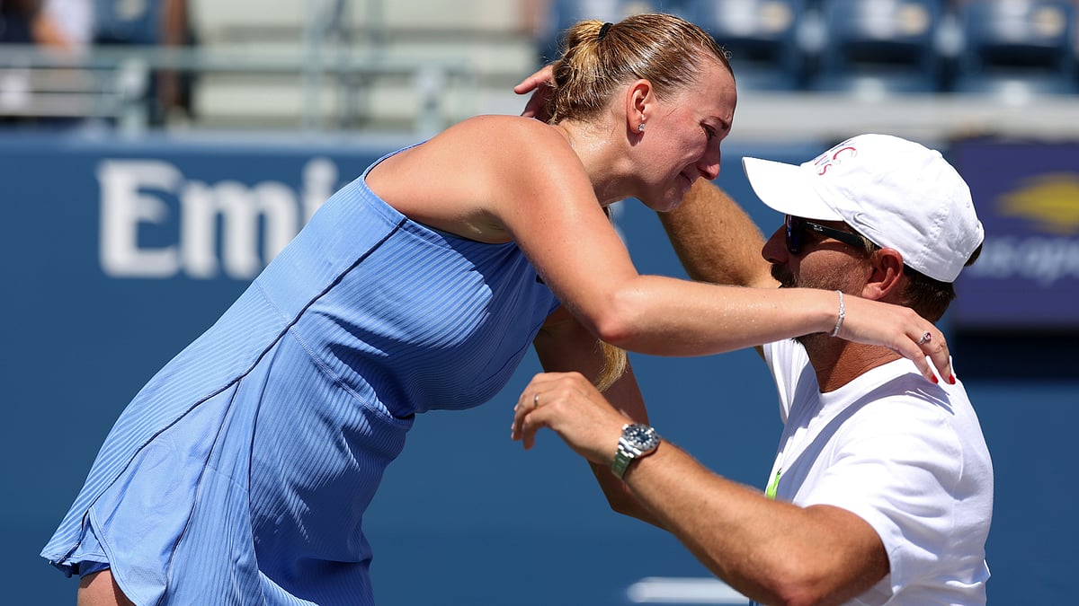 Petra Kvitova embraces her coach and husband Jiri Vanek - null