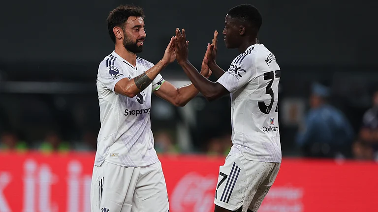 Kobbie Mainoo is now in direct competition with Bruno Fernandes, says Ruben Amorim - null