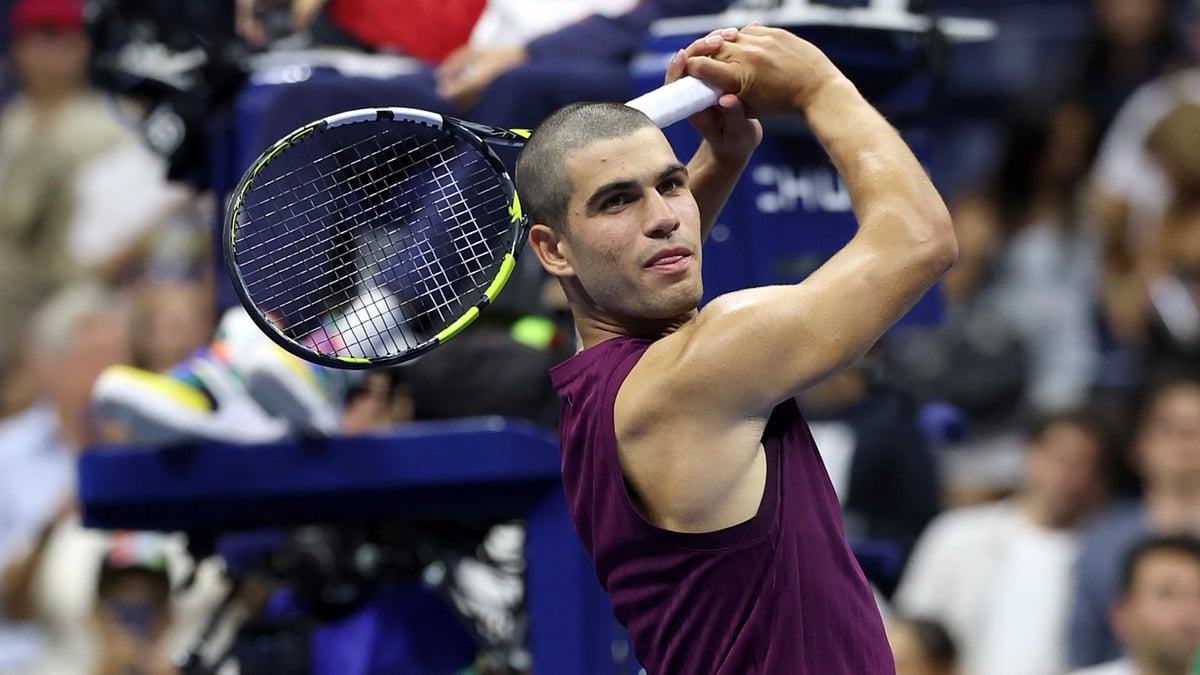 Carlos Alcaraz celebrates his win with a swing
