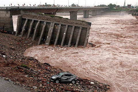 Bridge washes away amid flash floods in Jammu