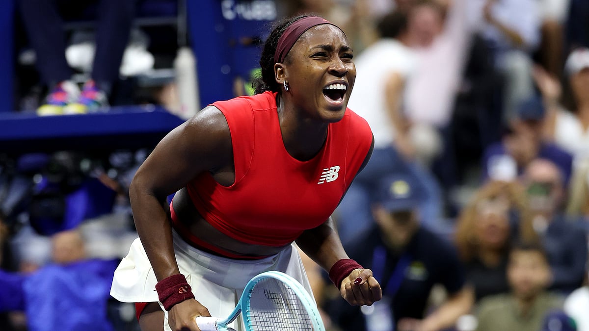 Coco Gauff celebrates after converting match point