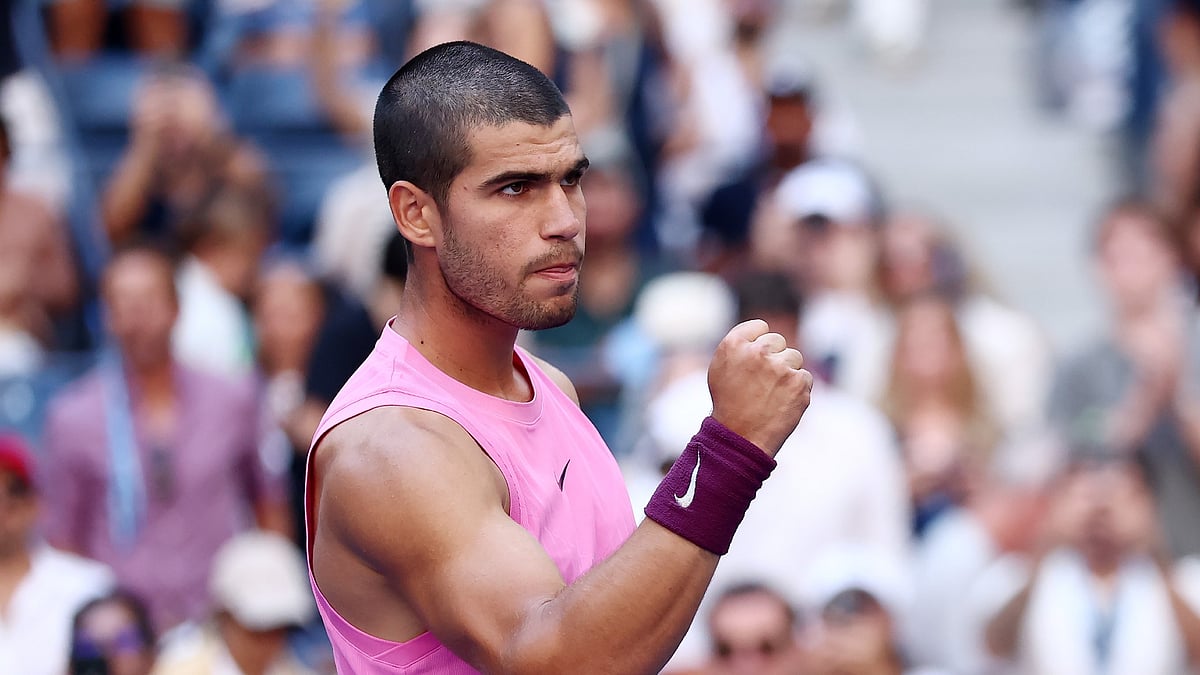 Carlos Alcaraz celebrates his win over Arthur Rinderknech in the US Open 2025.